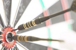 Photo of the bullseye in a dartboard.