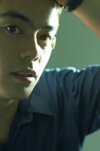 Close-up photo of an Asian teenager.