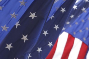 Closeup image of the several US flags.