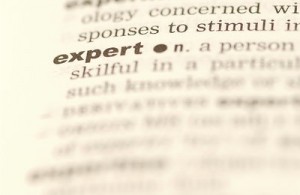 Closeup of the word "expert" in the dictionary.