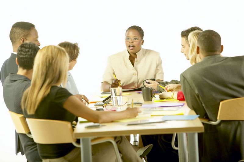 Group of people meeting around a table