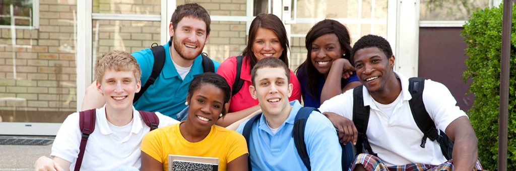 Cover photo of Youth in Action, 7 teens sitting together