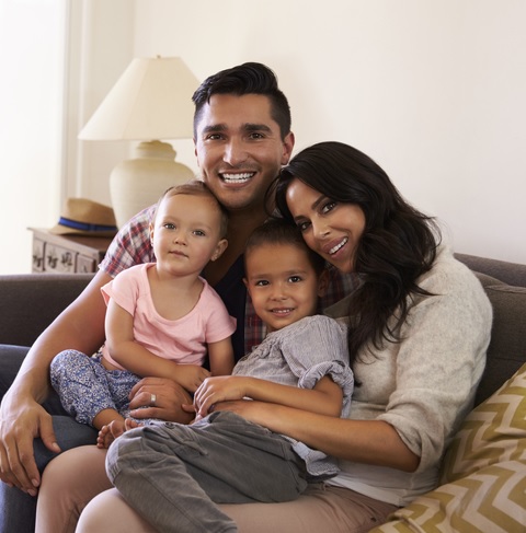 hisp-family-on-sofa hisp-family-on-sofa