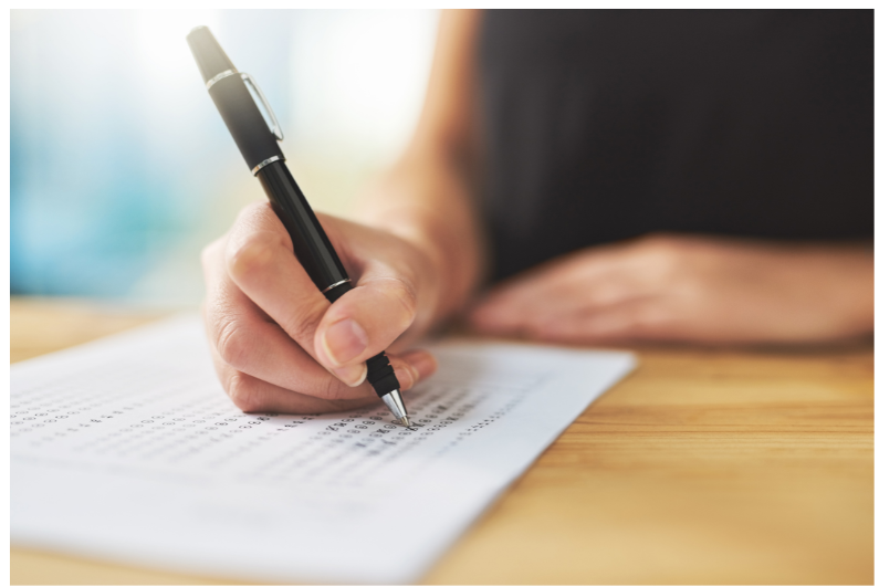 assessment Image of someone completing a test.