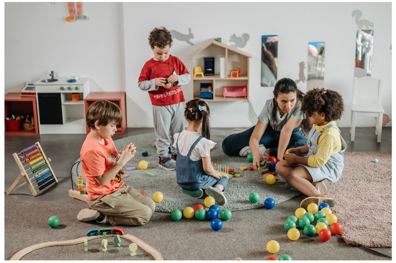earlychildhoodcenter Children playing in an early childhood center.