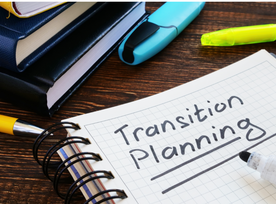 Transition Planning Stack of books and a notebook with Transition Planning written on it.