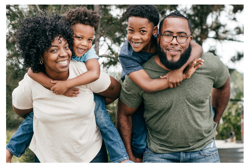 FamilyTogether Children on piggyback on parents.