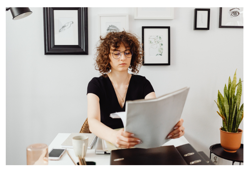 Woman reviewing doucments.